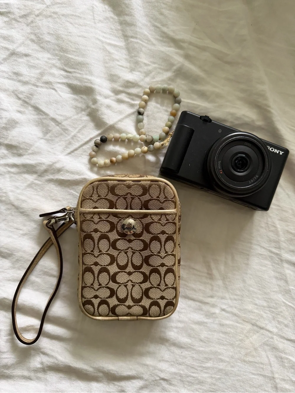 Coach Monogram Canvas Wristlet in Brown and Tan